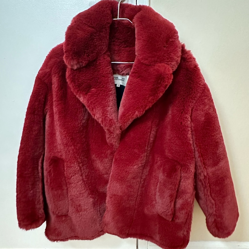 Excellent condition worn only twice